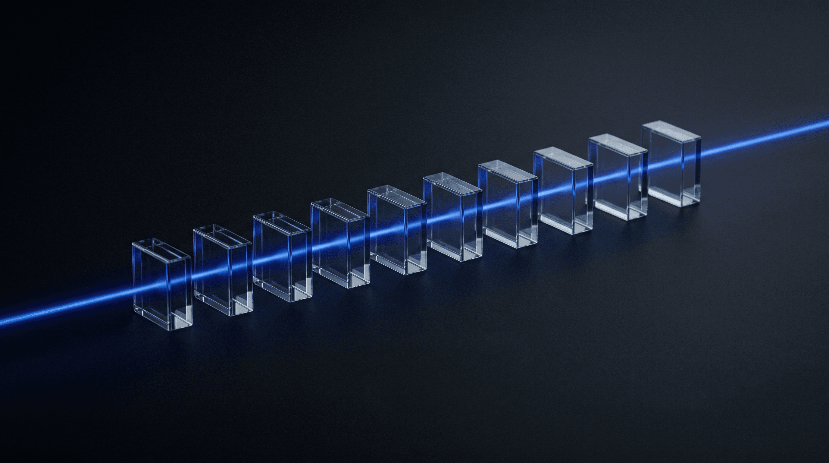 A row of glass cells carrying one continuous beam of light